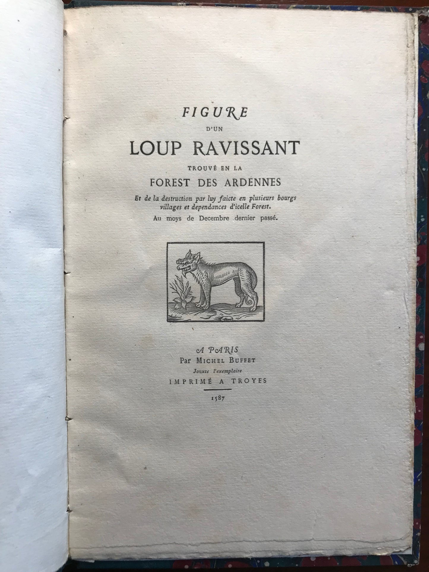 Figure d'un Loup ravissant trouvé en la Forest des Ardennes Et de la destruction par luy faicte en plusieurs bourgs, villages et dépendance d'icelle Forest. Au mois de décembre dernier passé. - 1876